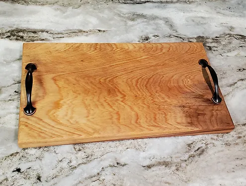 Personalized Cypress Charcuterie Board with Bronze Handles shown on granite