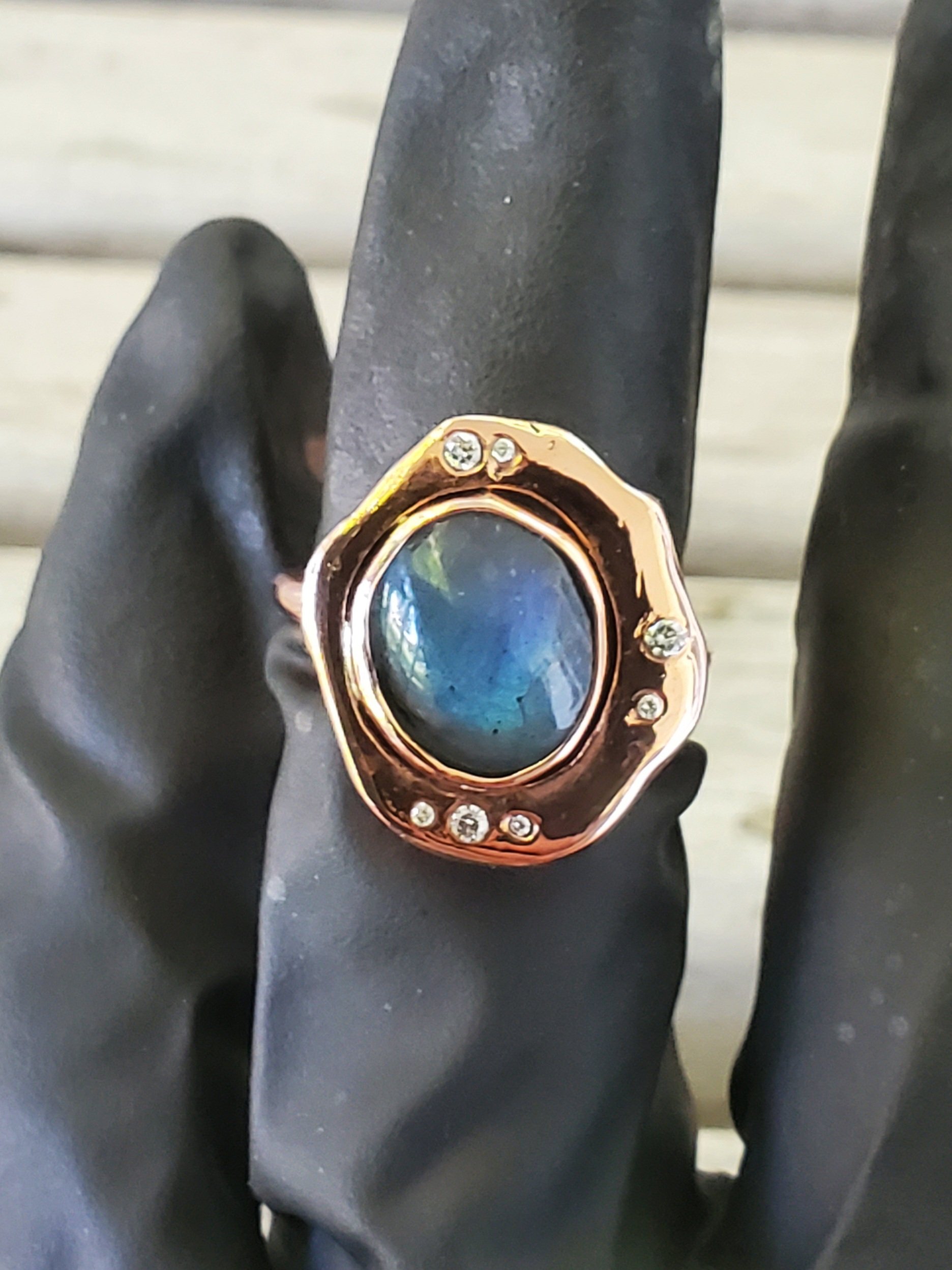Labradorite Cabochon Copper Ring on model's middle finger