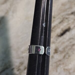 Sterling Silver Gemstone Ring on a ring mandrel showing a small opening to make the ring adjustable