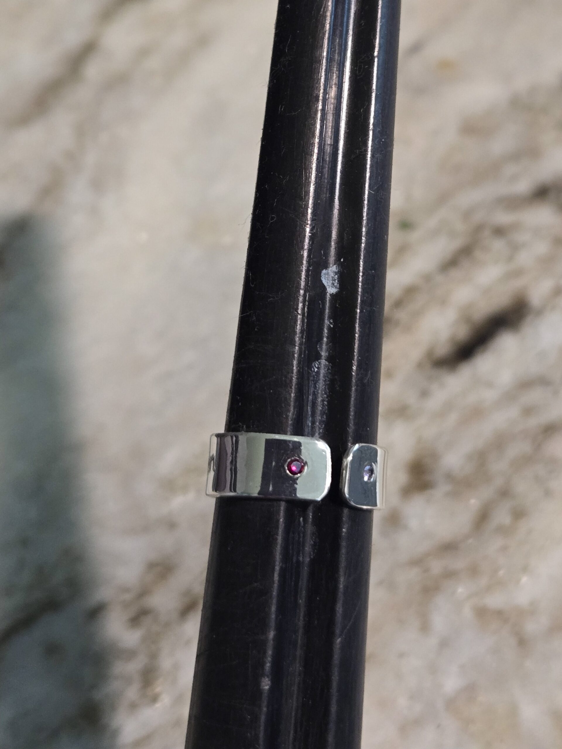 Sterling Silver Gemstone Ring on a ring mandrel showing a small opening to make the ring adjustable