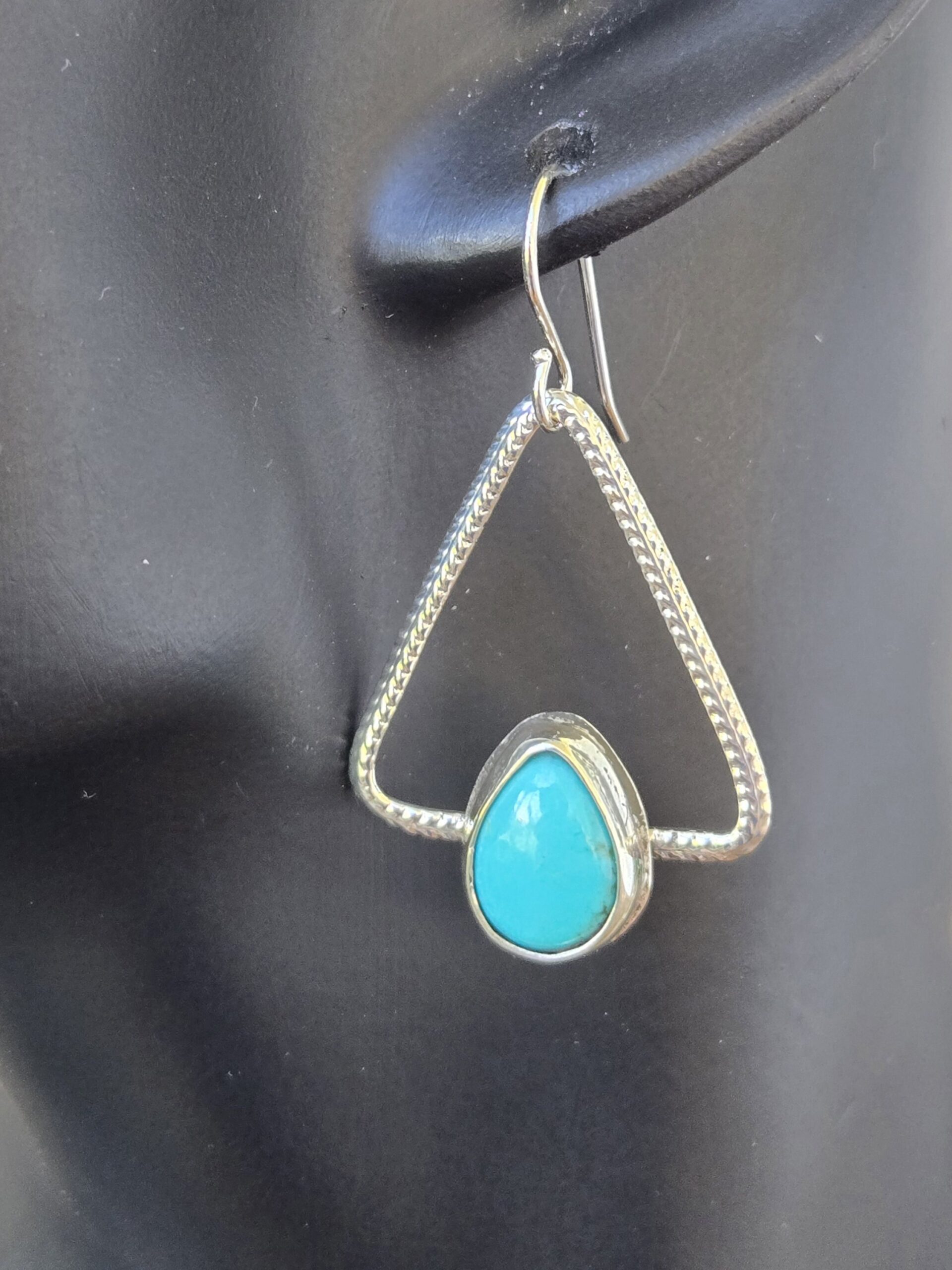 Teardrop Turquoise Cabochon Triangular Sterling Silver Wire Earrings shown on a model