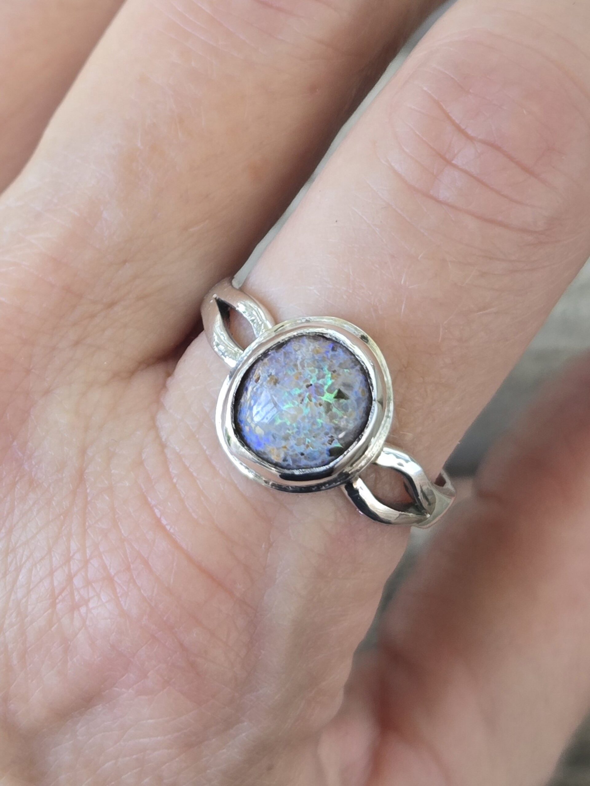Oval Louisiana Opal Cabochon in a Sterling Silver Bezel on a Sterling Silver Split Ring