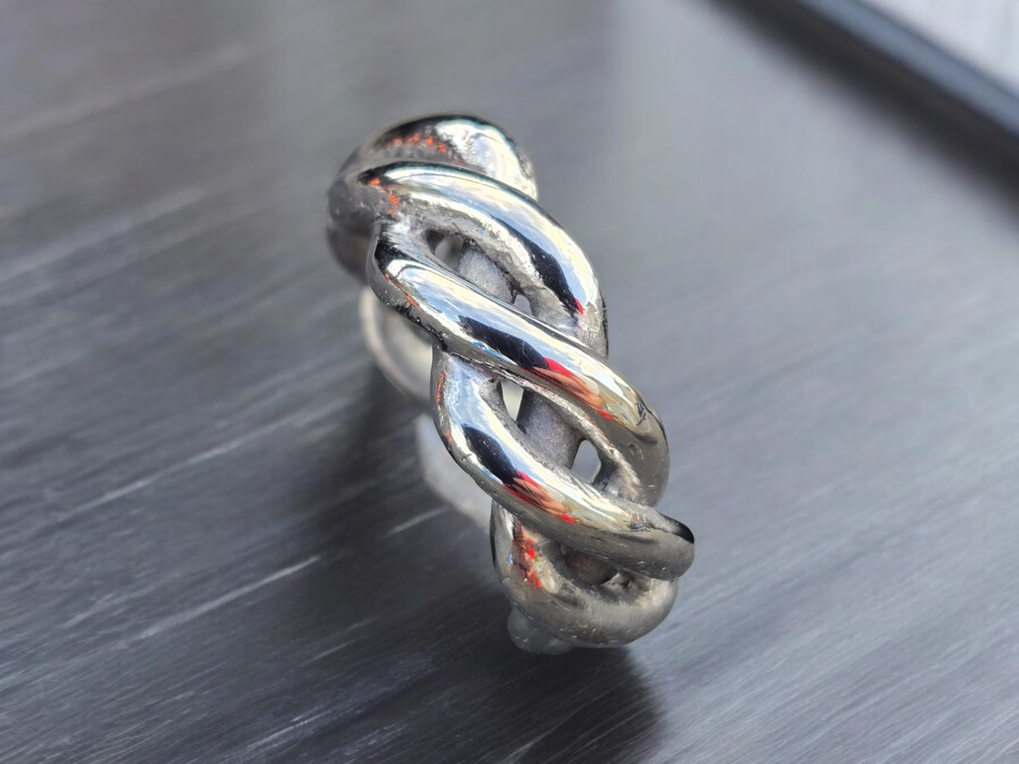Stainless Steel Braided Ring showing polished braided finish