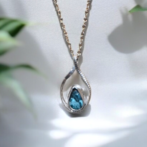 Sterling Silver Teardrop Turquoise Infinity Cabochon Necklace