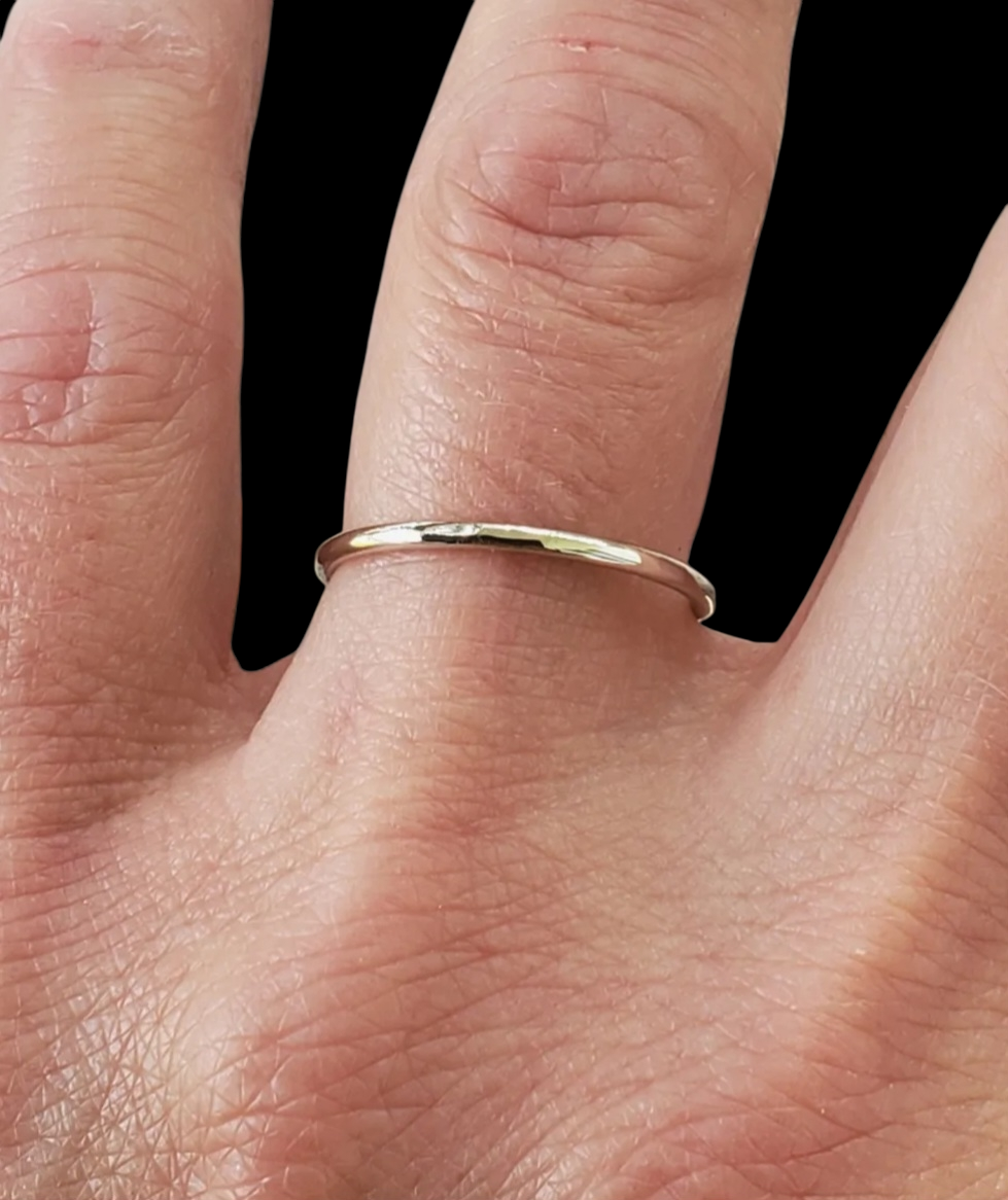 Slim Hammered Solid 14k White Gold Ring shown on models middle finger